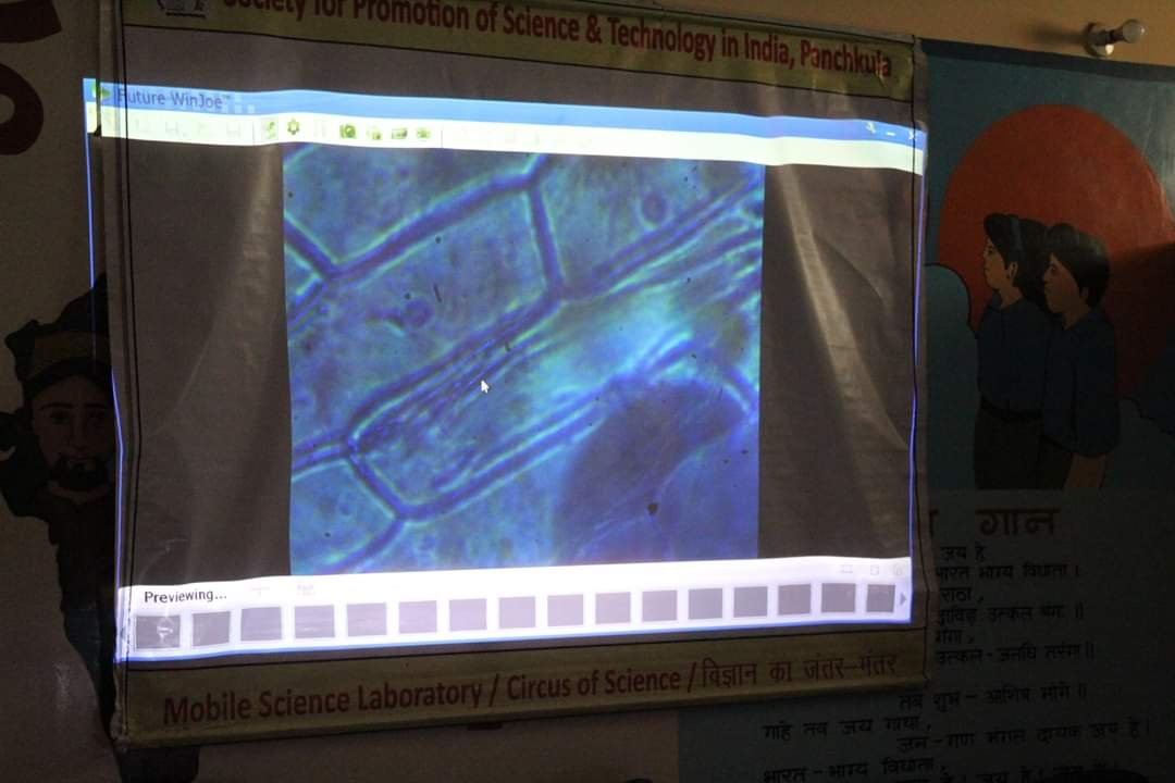 Students observed Onion Cells through Projection Microscope at Govt. Sr. Sec. School, Balahi